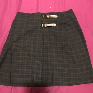 Tracy Evans get plaid skirt
